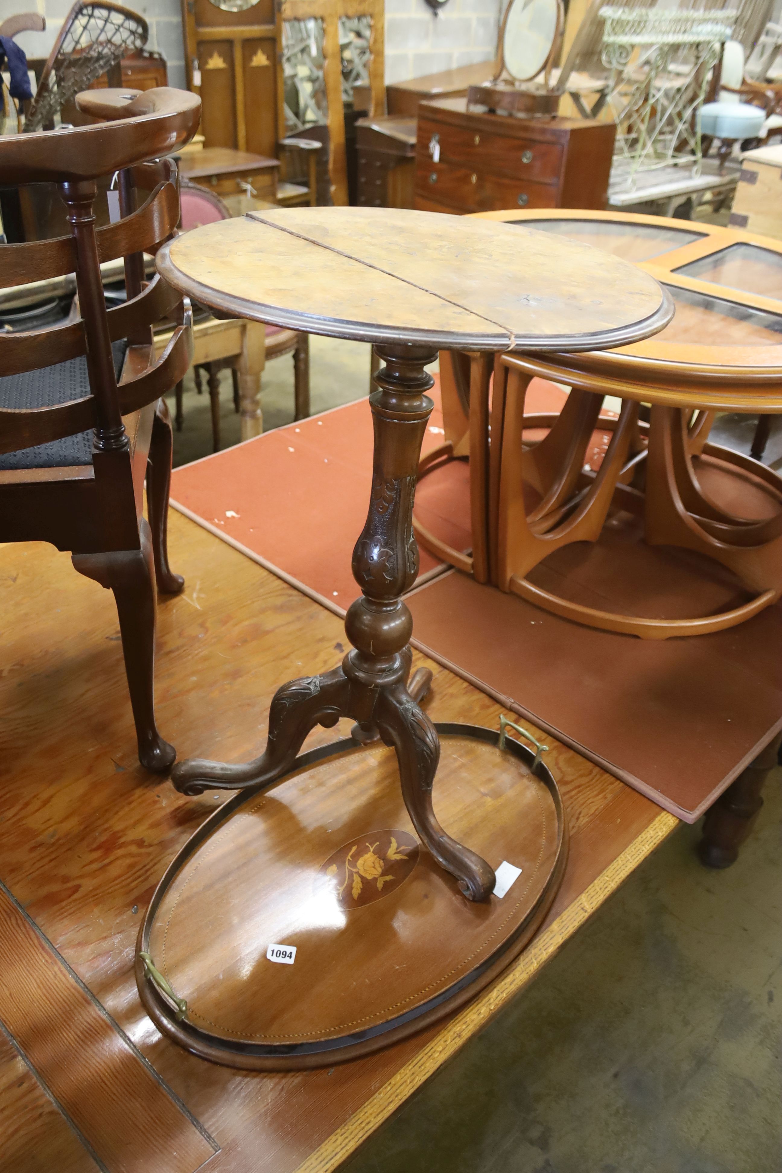 A Victorian walnut circular tripod table (a.f.) and an Edwardian inlaid oval tea tray